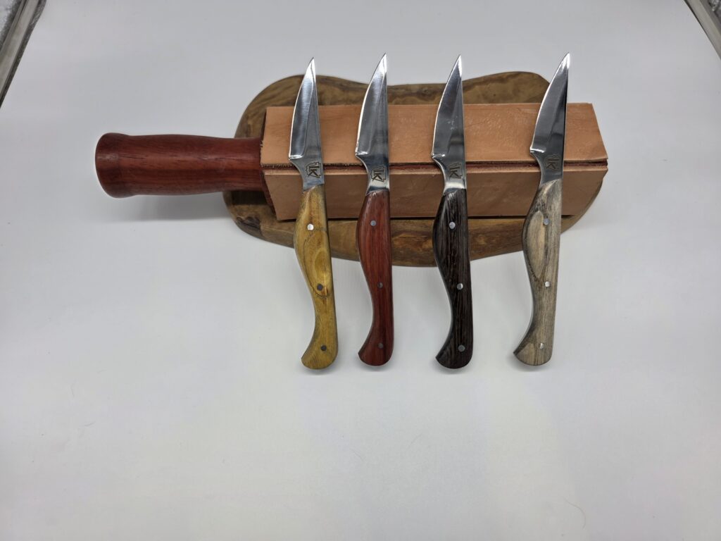 LK Scribe — four blade profiles, four handle materials